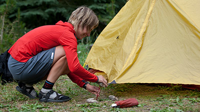 Secure your tent for good bike camping experiences.