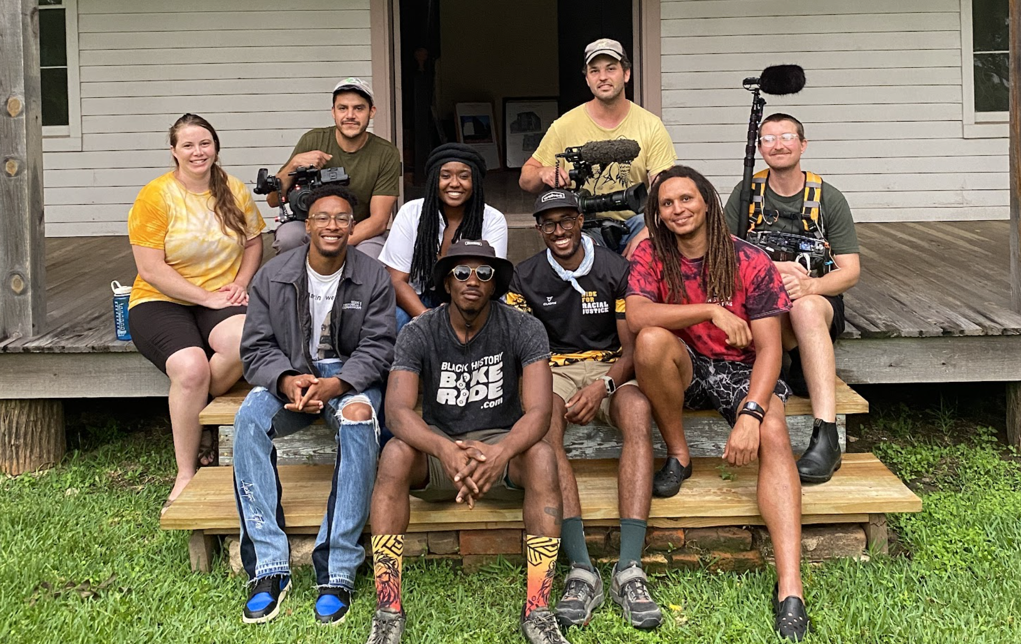 a group of men on a stoop