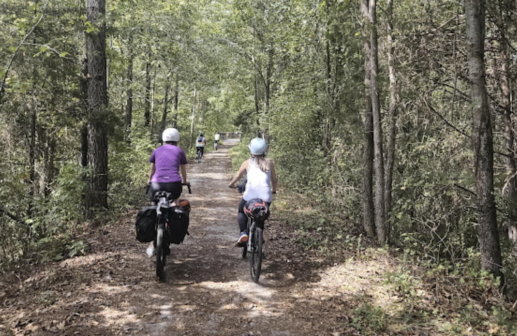 women from behind on bikes