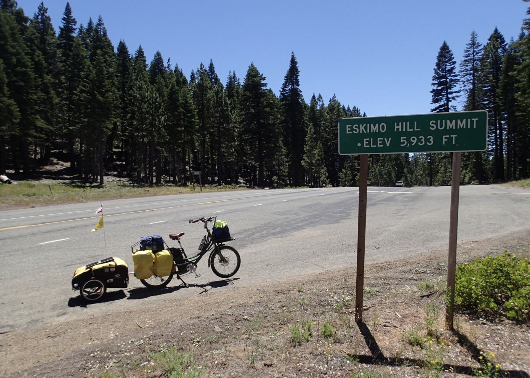 bike next to a road sign